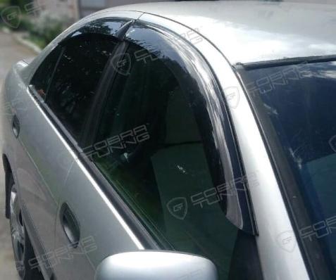Дефлекторы окон (ветровики) Nissan Almera Classic (Ниссан Альемра) Евростандарт 2006-2012 клеятся на скотче Кобра Тюнинг