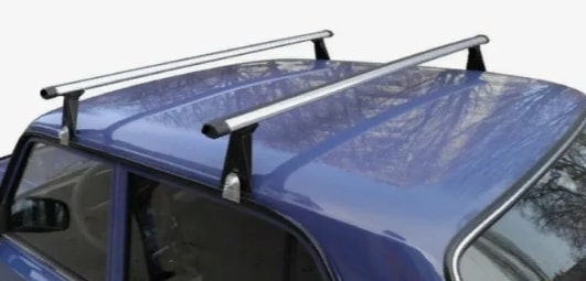Багажник на крышу для Opel Corsa на водостоки (аэродинамические дуги) Евродеталь