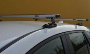 Багажник на крышу для Fiat Doblo (2008-2024) в штатные места (аэродинамические дуги) Евродеталь